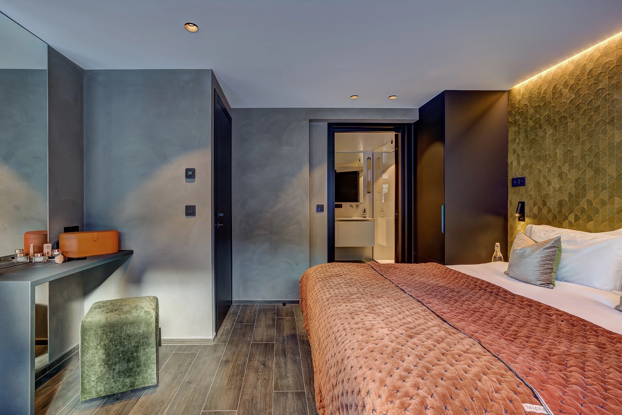 Bedroom 1 with restful palette and ensuite access
